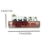 Silberes Emblem mit dem Text Queen Edition, 3,3 cm groß.