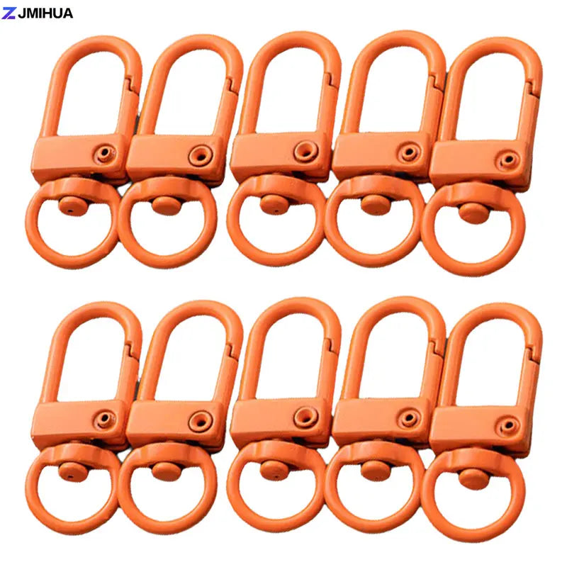 A set of orange lobster clasp hooks for jewelry making and DIY crafts