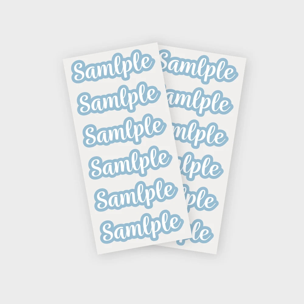 A sheet of white paper with light blue text repeating the word Sample multiple times.