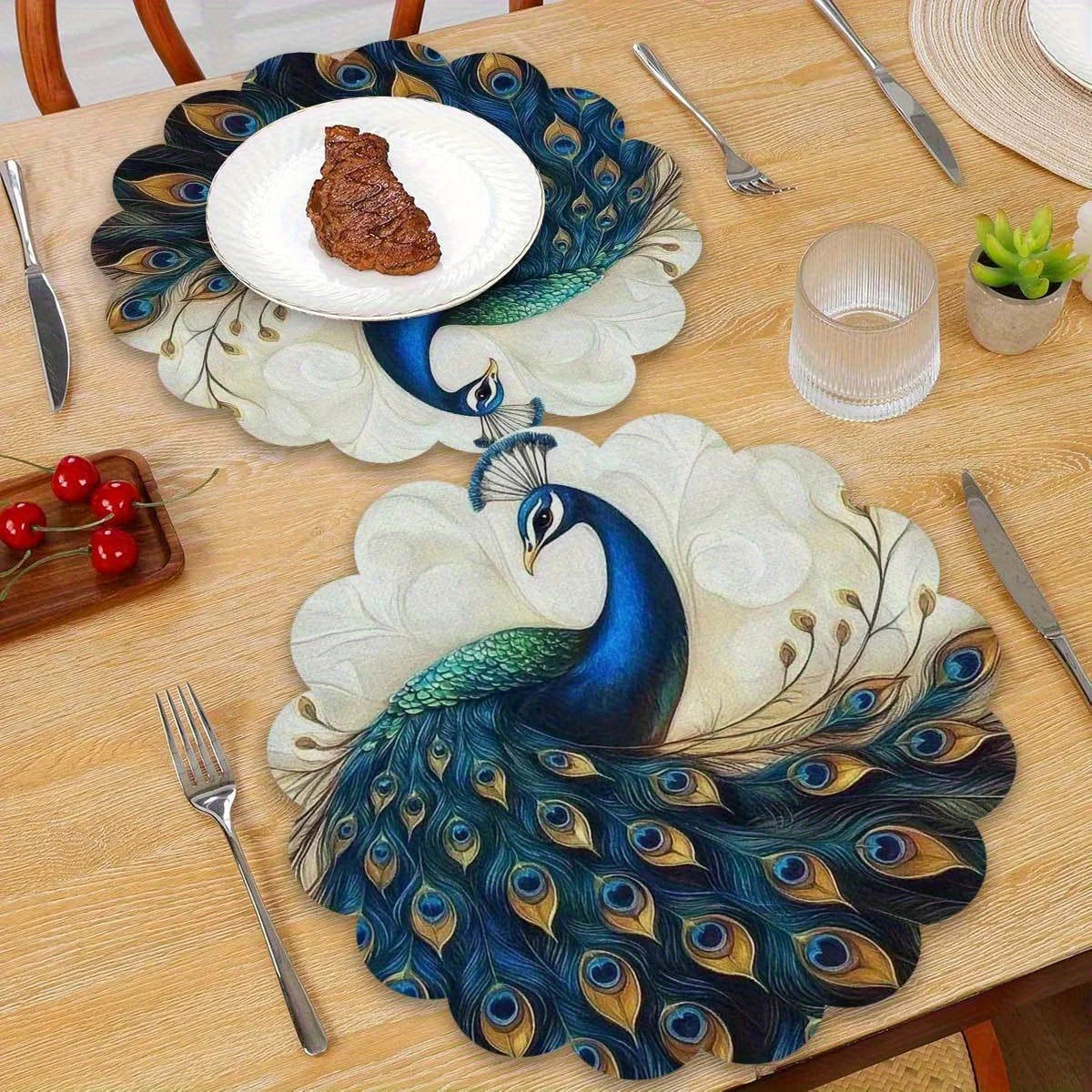 A set of four peacock feather placemats is displayed on a wooden table, featuring blue and green feathers for elegant dining 