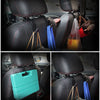 Four car headrest hooks in various colors and materials for storing bags and items.