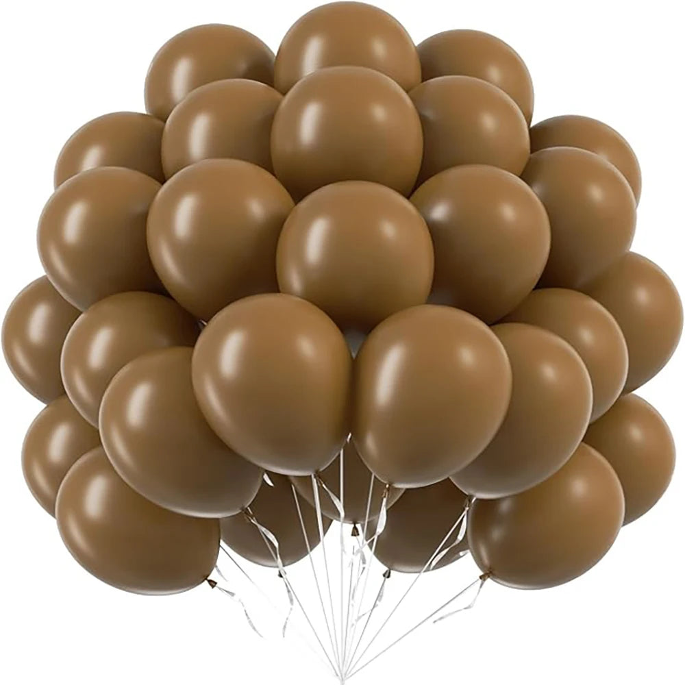 A bunch of tan and beige pastel latex balloons tied together for party decorations