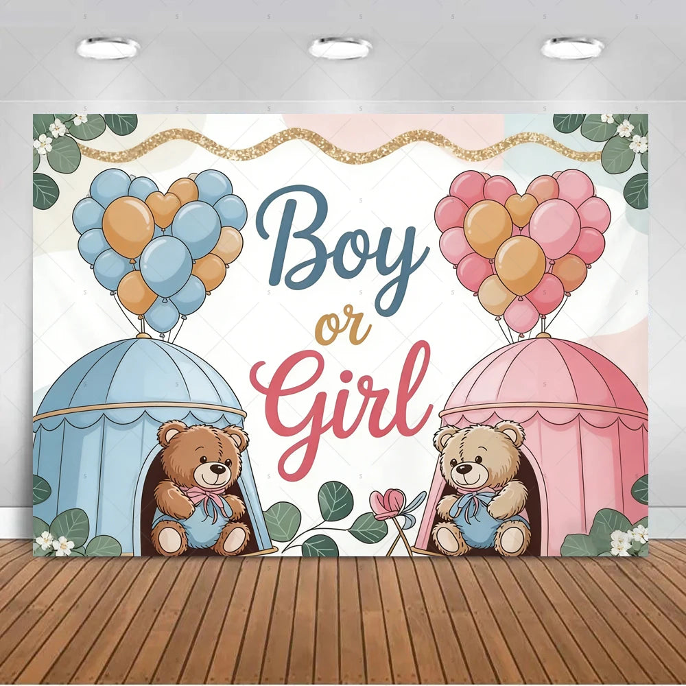 A gender reveal backdrop featuring pink and blue balloons, a wooden bear, and a pink and blue dome structure.
