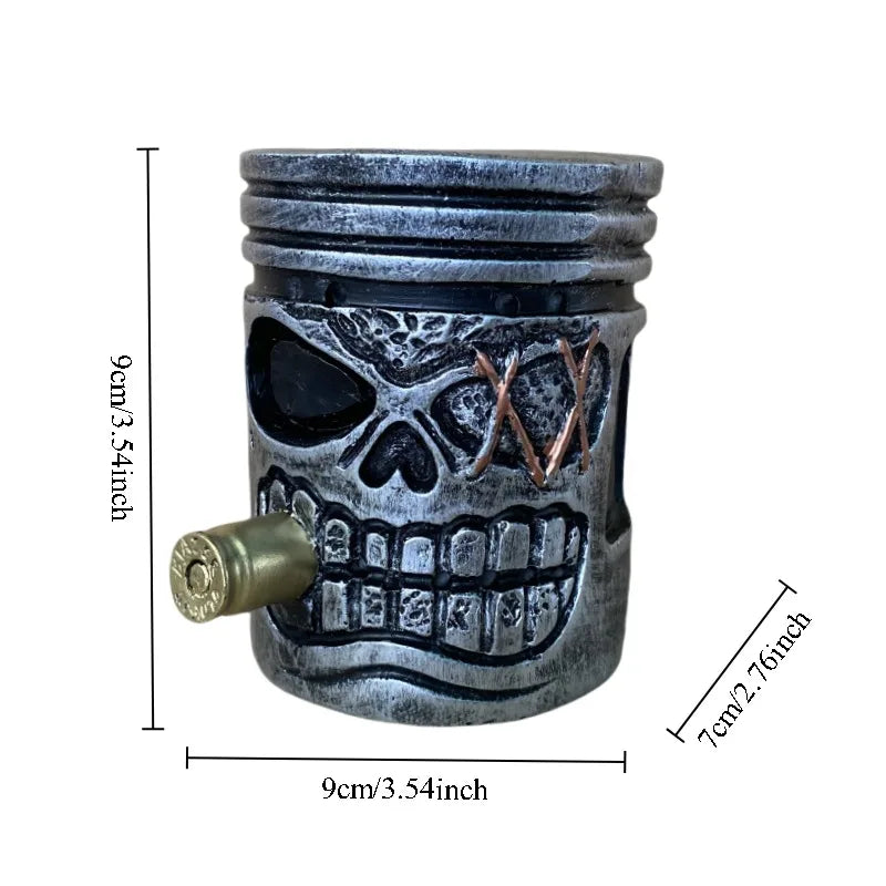 A dark gray mechanical punk style piston skull sculpture with detailed facial features and texture.