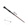 A long, dark brown magic wand with a fuzzy tip and a pointed end, shown next to a circular view.