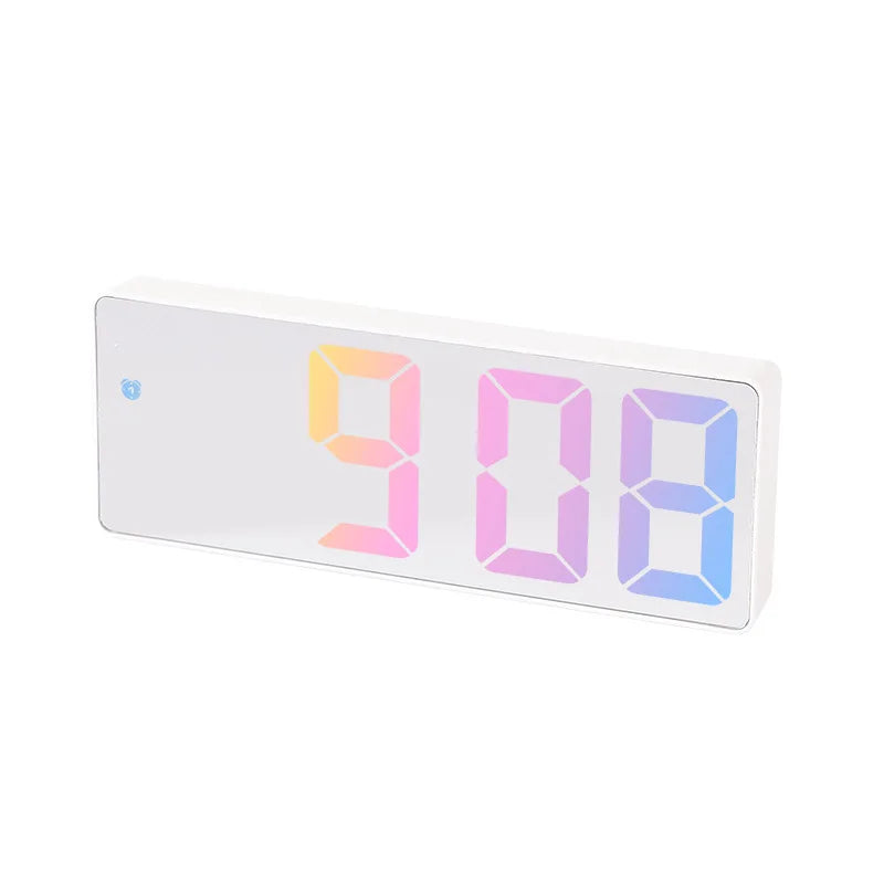 A white digital alarm clock displaying the time 9:08 with soft pink and blue light accents.
