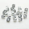 A collection of clear square cut glass crystal beads for jewelry making