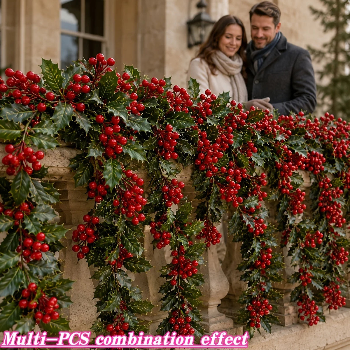 Artificial red berry holly Christmas garland draped over a stone ledge with a couple in the background