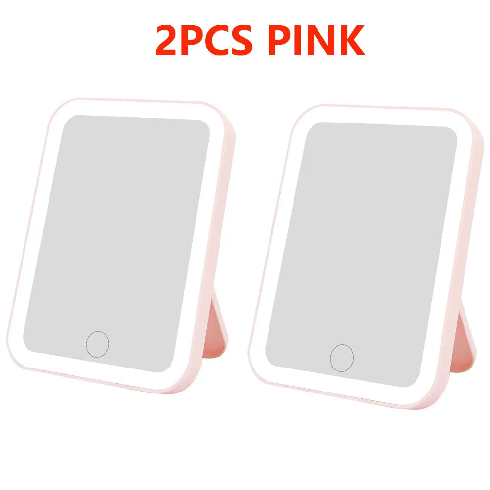 Two pink touch screen LED vanity mirrors displayed side by side.