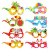A set of colorful Hawaiian luau party sunglasses and table mats featuring tropical designs.