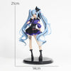 A gothic lolita Miku action fairy doll with long light blue hair and a black outfit standing on a round base.