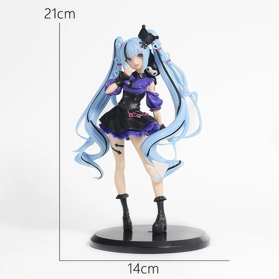 A gothic lolita Miku action fairy doll with long light blue hair and a black outfit standing on a round base.