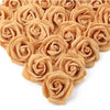 A dense cluster of artificial foam rose decorations in a natural beige or peach color.