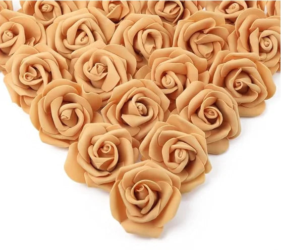 A dense cluster of artificial foam rose decorations in a natural beige or peach color.