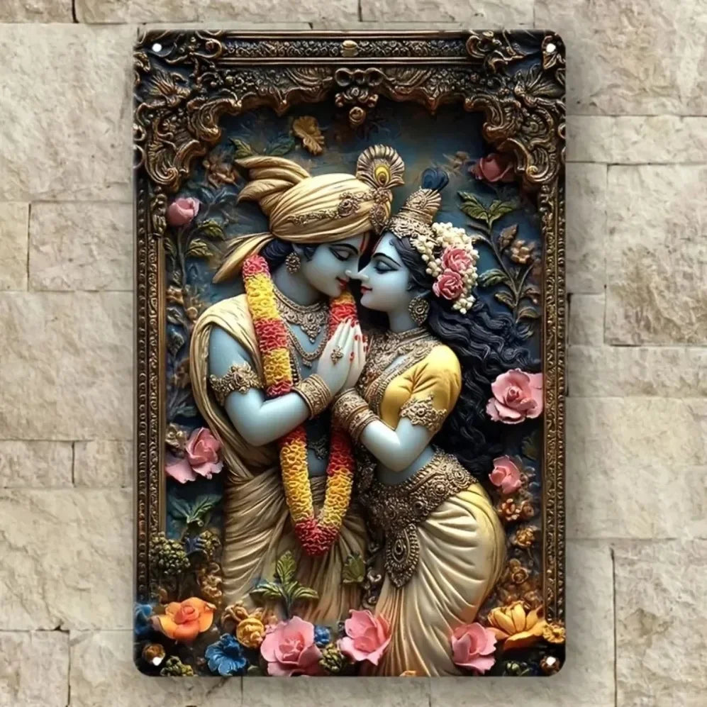 A metal wall art statue depicting a divine couple, Durga and Lakshmi, in traditional attire surrounded by floral elements.