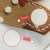 Close-up view of a brown gingerbread man printed placemat showing front and back details.