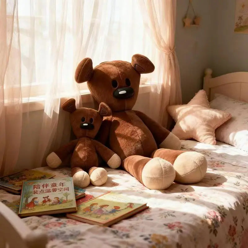 A brown teddy bear stuffed plush toy sitting on a bed next to a window with sheer curtains.