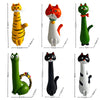 A collection of various cat-shaped resin vases and figurines in yellow, white, and green colors.