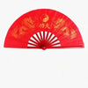 Red traditional bamboo folding fan featuring a gold dragon design and a yin-yang symbol.