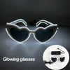 Pair of glowing heart-shaped sunglasses with LED lights