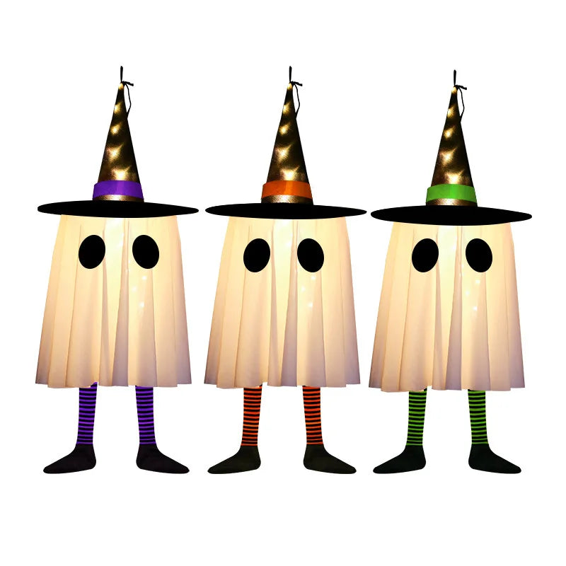 Three hanging ghost lights shaped like witches hats illuminate a white ghost figure.