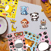A collection of cartoon animal puzzle stickers featuring elephants, pandas, giraffes, and tigers on a gray background.