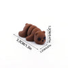 A set of three brown 3D printed cartoon animal figurines with measurements provided.