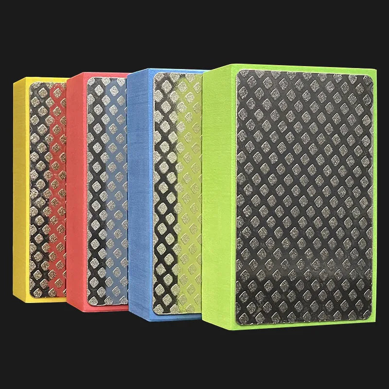 A set of five rectangular polishing pads in yellow, red, blue, lime green, and black with diamond patterns.