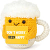 Handmade crochet donkey mug with a yellow tag that reads Don't worry beer happy