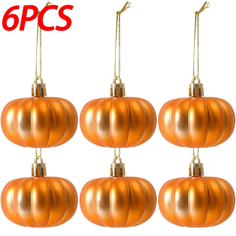 Six golden orange pumpkin hanging ornaments displayed against a white background.