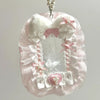 Porte-cartes en dentelle rose et blanche avec charmons de ruban pour un porte-cartes DIY