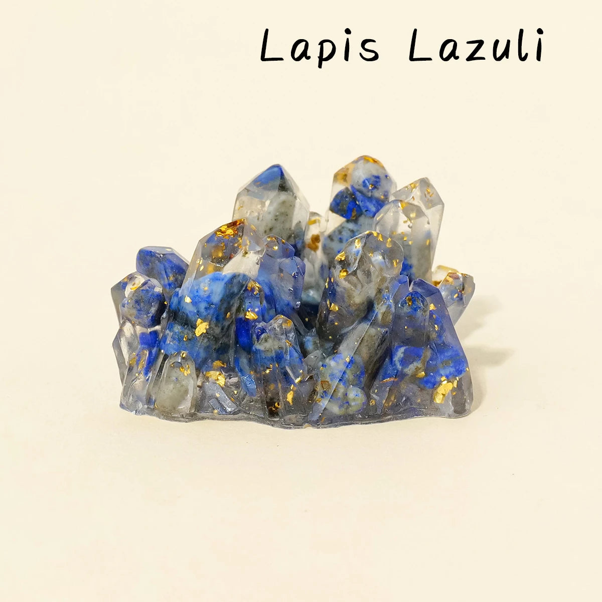 A cluster of blue and gray lapis lazuli crystals with gold inclusions.