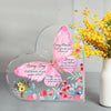 Heart-shaped acrylic decor featuring pink and green floral designs with inspirational Bible verses