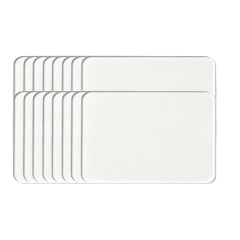A set of clear acrylic fridge magnets with flexible magnetic backing.