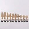 A set of wooden Christmas tree ornaments in various sizes and finishes arranged in a line.