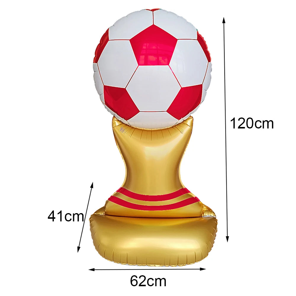 A standing soccer balloon featuring a red and white football on top, mounted on a gold base.