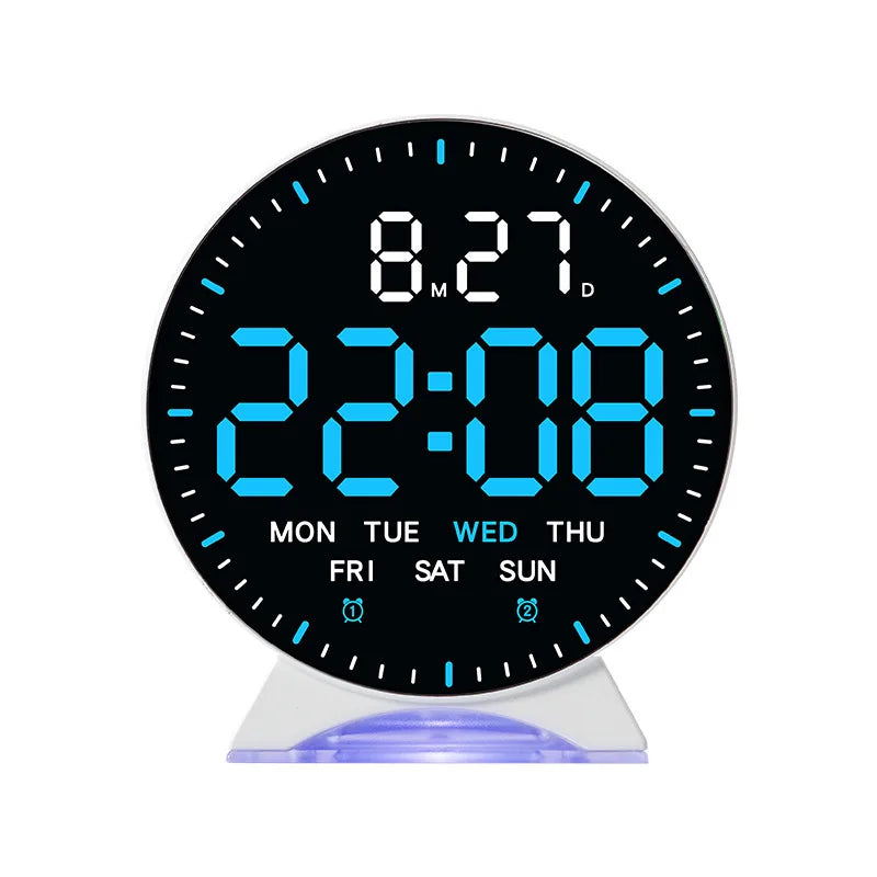 A digital alarm clock display showing 22:08 and 8.27, featuring a blue LED screen.