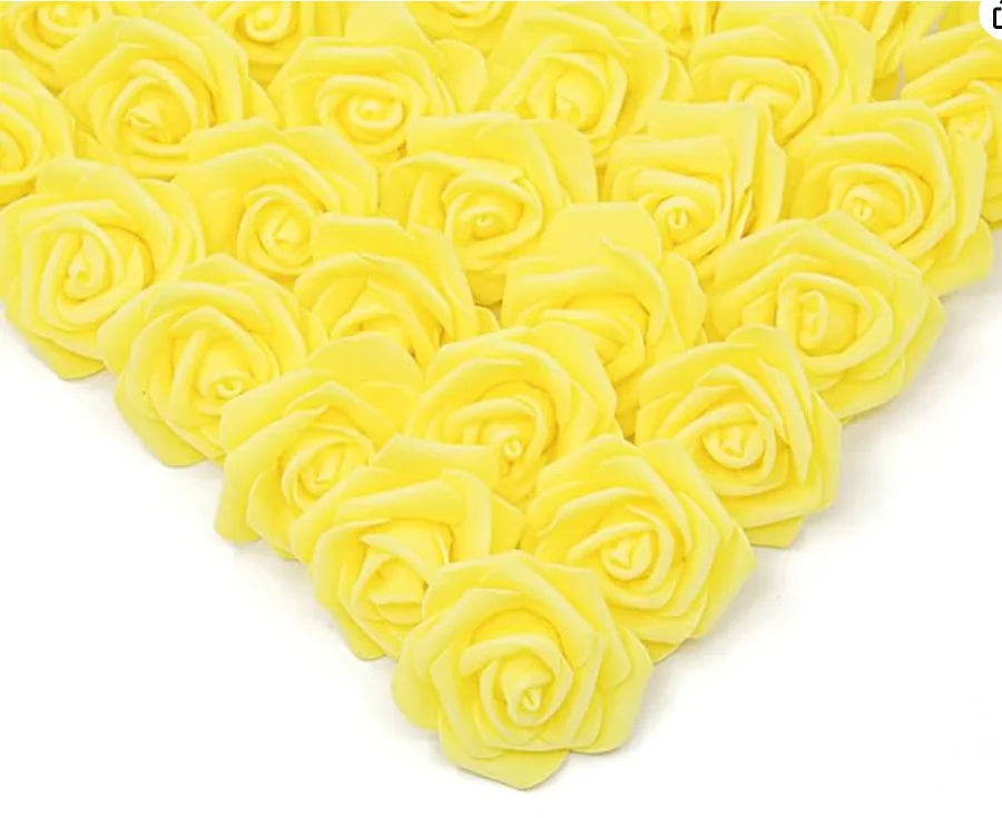 A cluster of bright yellow artificial foam rose decorations.
