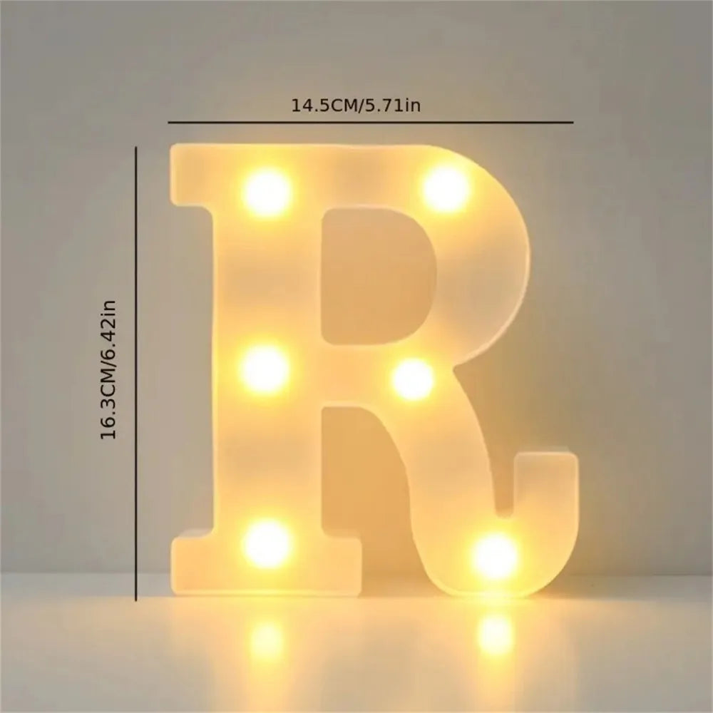 A glowing yellow LED letter light shaped like the letter R, used for room or party decor.