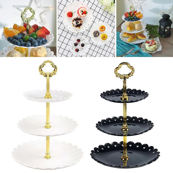 A three-tier decorative stand for displaying fruit and desserts, featuring white and black plates.