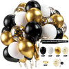 A collection of black, gold, and white latex balloons in various sizes and finishes for parties
