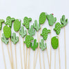 Green cactus cocktail picks with pearl tips on bamboo sticks
