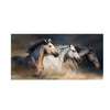 A group of powerful horses galloping through dust and fog.