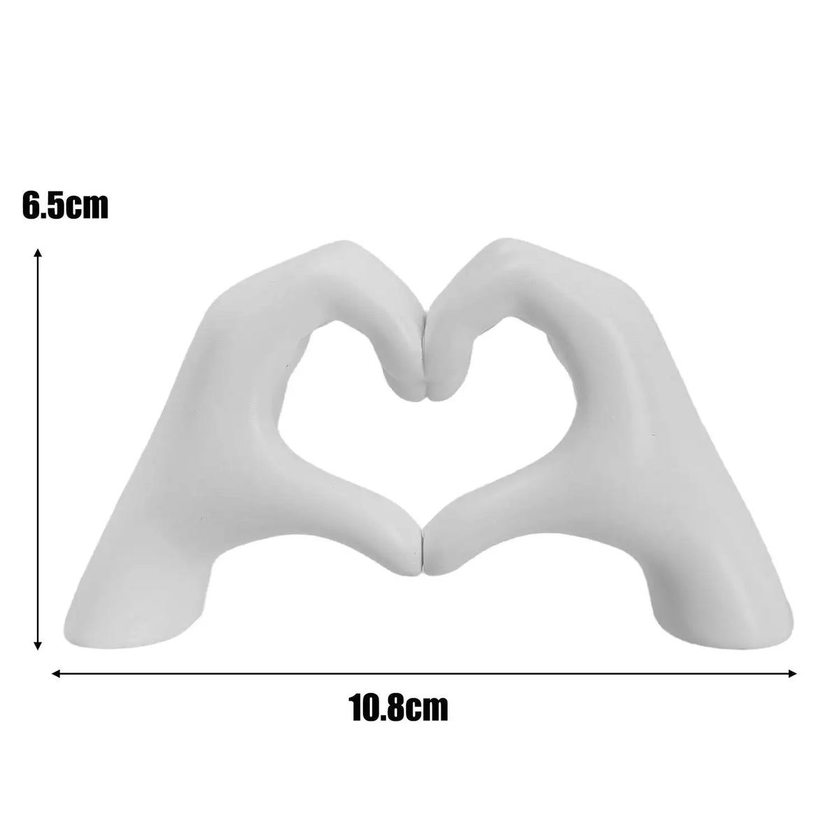 White heart-shaped sculpture made of smooth, curved material for home decor or gifting