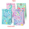 A set of 12 colorful mermaid-themed party favors and decorations in pink, teal, and green packaging.
