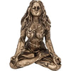 A bronze statue of a female figure with long flowing hair in a meditative pose.