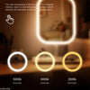 A close-up of a smart LED makeup vanity mirror displaying different color temperatures for light.