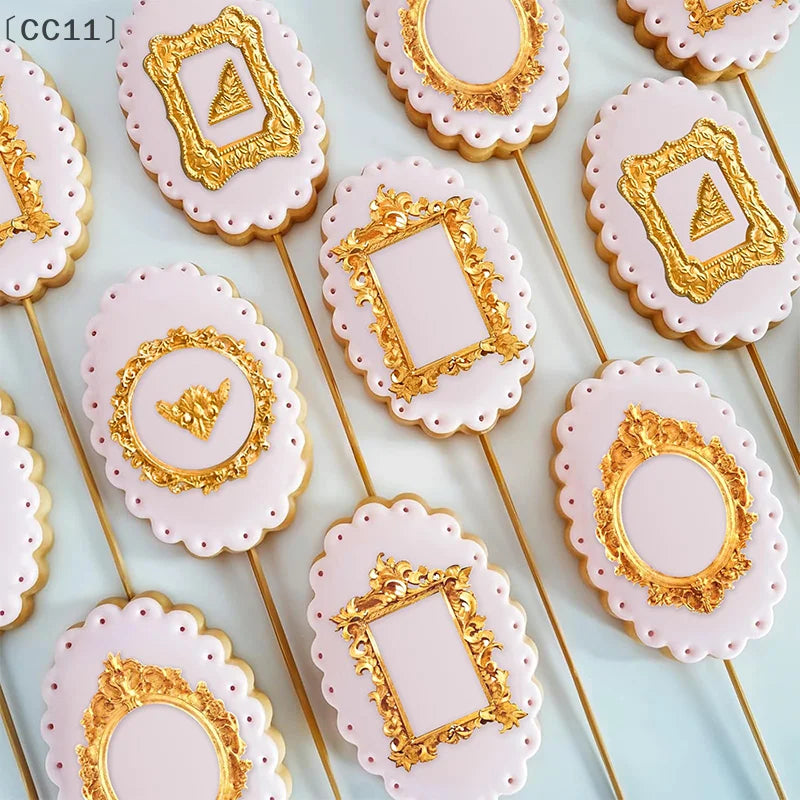 Four pink silicone frame molds with gold accents for chocolate, clay, and crafts