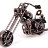 A handcrafted metal motorcycle model with a vintage diecast appearance, shown in a dark finish.