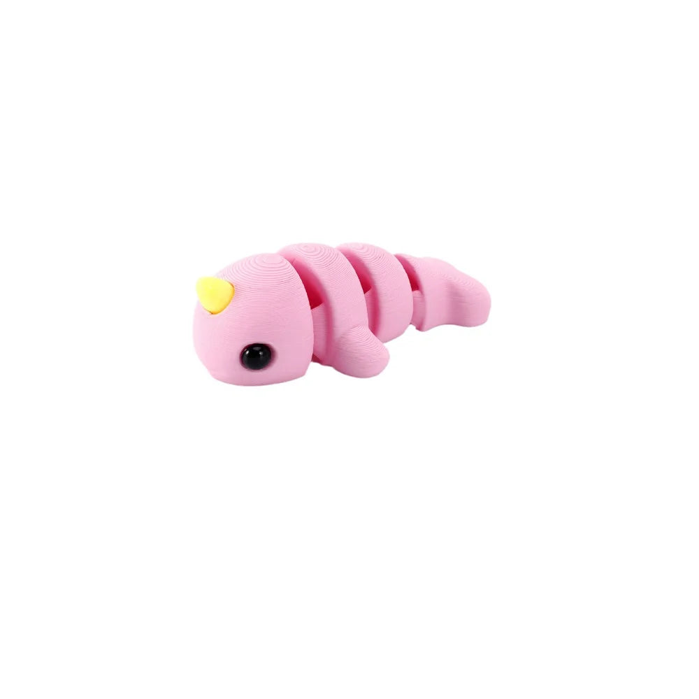Pink, articulated 3D printed marine animal figurine with a yellow snout.